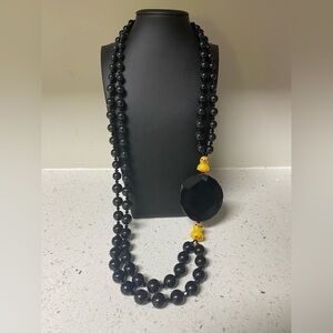 Black glass two strand w/ glass duck and agate